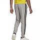 Tepláky adidas Essentials Tapered Cuff 3 Stripes M GK8889