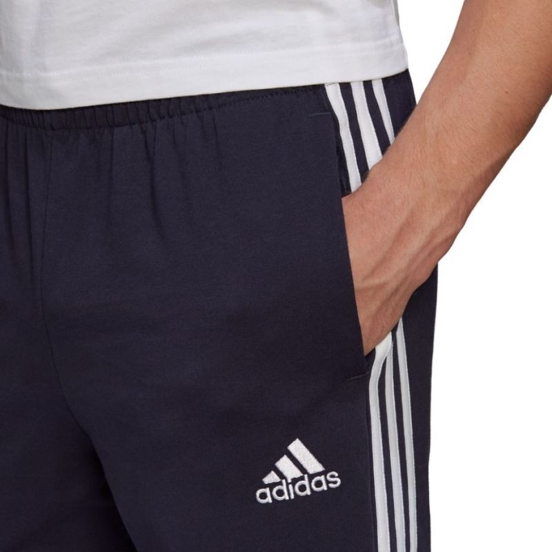 Tepláky adidas Essentials Single M GK8997