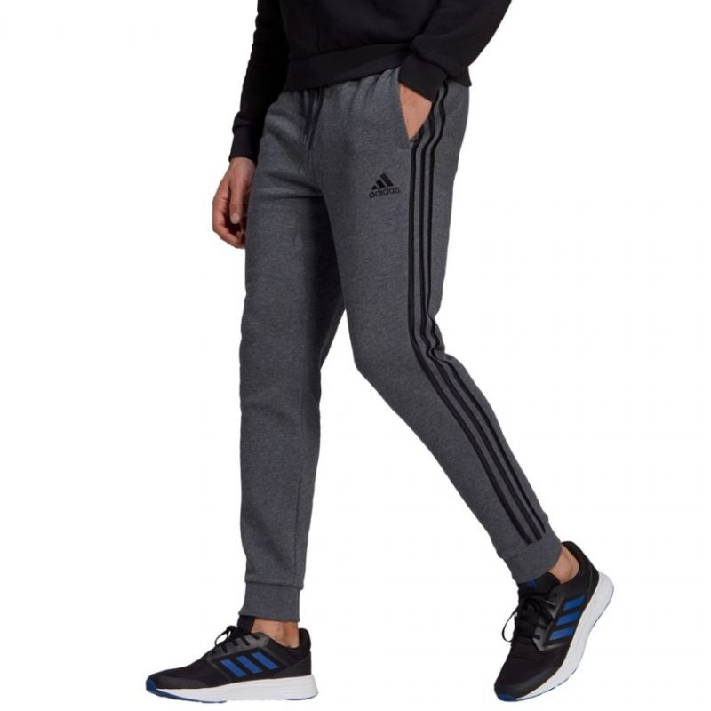 Tepláky adidas Essentials Tapered Cuff 3 Stripes M GK8826