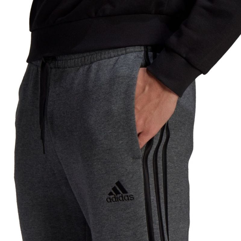 Tepláky adidas Essentials Tapered Cuff 3 Stripes M GK8826