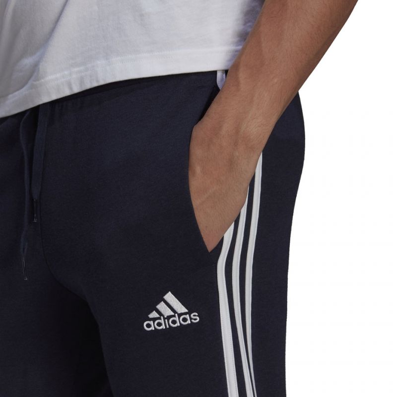 Tepláky adidas Essentials Slim 3 Stripes Pants M GM1090